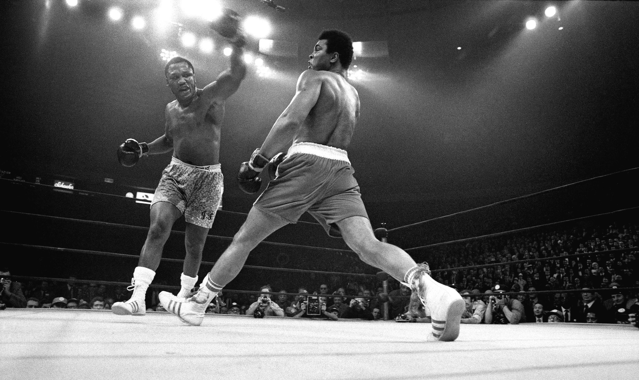 Muhammad Ali boxes Joe Frazier
